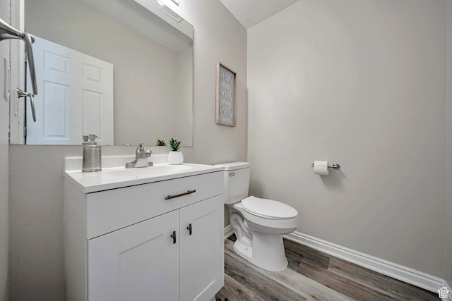 5961 W Chiswick Ct, West Jordan, UT 84081 - bathroom featuring wood finished floors and vanity