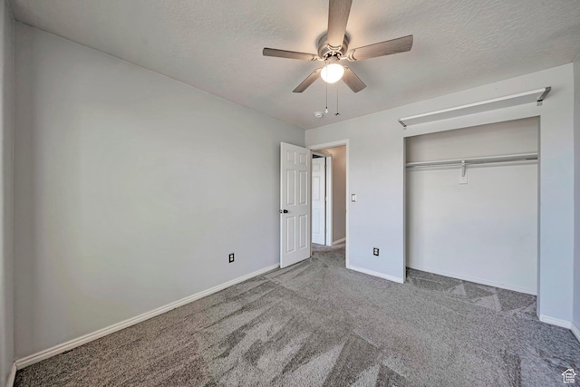 5961 W Chiswick Ct, West Jordan, UT 84081 - unfurnished bedroom featuring carpet flooring, a textured ceiling, a closet, and a ceiling fan