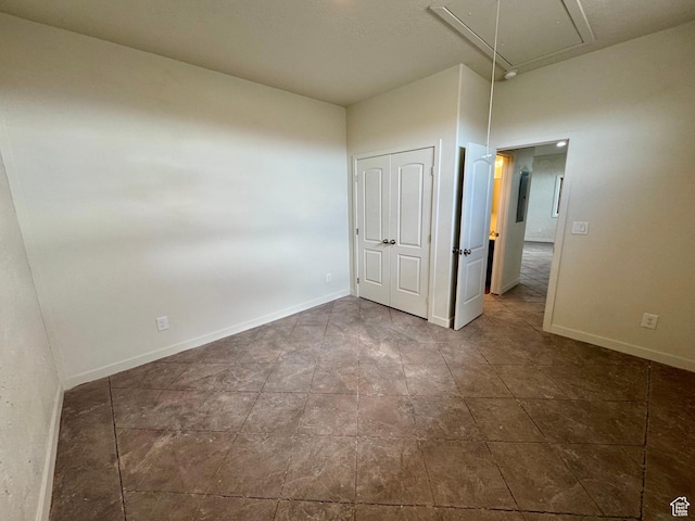 20473 W 4500 S, Duchesne, UT 84021 - unfurnished bedroom featuring attic access and a closet