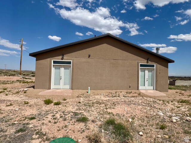 20473 W 4500 S, Duchesne, UT 84021 - rear view of property with french doors and stucco siding