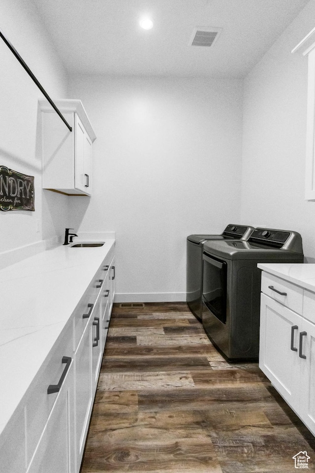 1952 N Sr 118, Monroe, UT 84754 - laundry area featuring washer and clothes dryer, cabinet space, dark wood finished floors, and recessed lighting