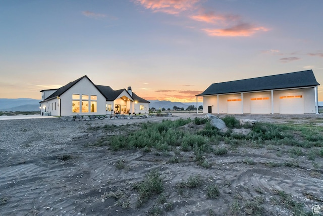 1952 N Sr 118, Monroe, UT 84754 - rear view of property with a detached garage and stucco siding