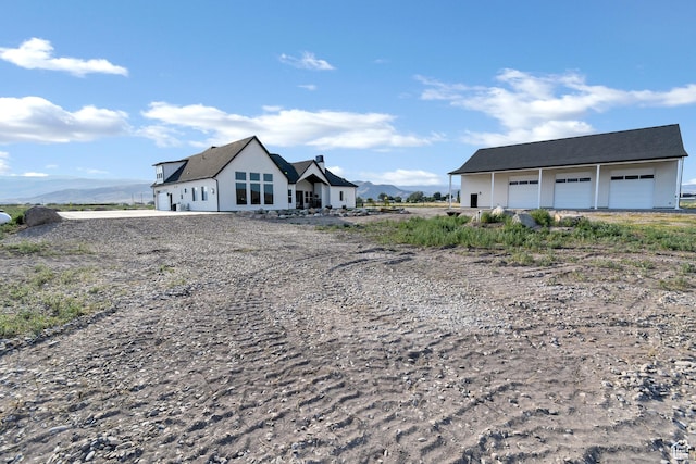 1952 N Sr 118, Monroe, UT 84754 - view of front of property featuring a detached garage and a mountain view