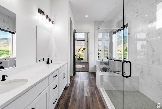 1952 N Sr 118, Monroe, UT 84754 - full bath featuring plenty of natural light, double vanity, a marble finish shower, wood finished floors, and recessed lighting