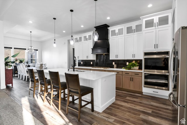 1952 N Sr 118, Monroe, UT 84754 - kitchen featuring recessed lighting, tasteful backsplash, appliances with stainless steel finishes, dark wood-style flooring, and a kitchen island with sink