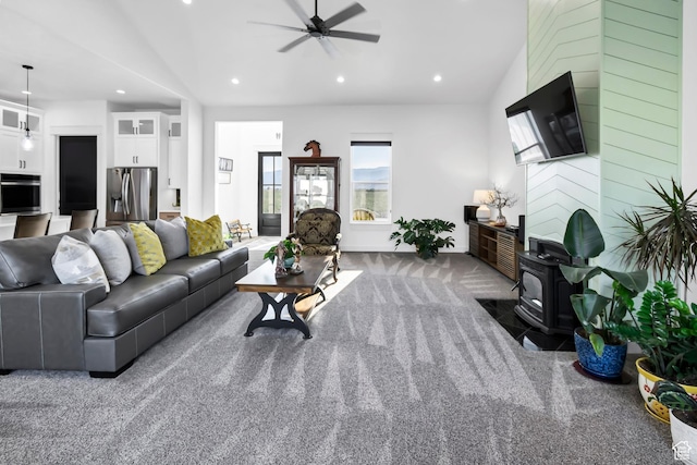 1952 N Sr 118, Monroe, UT 84754 - living room with a wood stove, carpet floors, ceiling fan, recessed lighting, and lofted ceiling