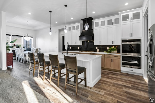 1952 N Sr 118, Monroe, UT 84754 - kitchen featuring stainless steel appliances, dark wood-type flooring, a chandelier, light countertops, and decorative backsplash