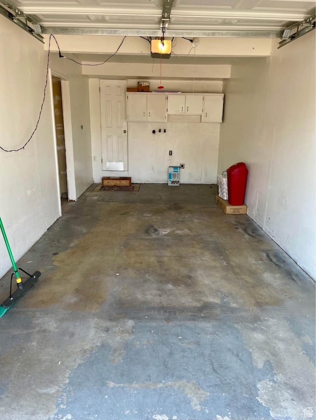 1192 W 4365 S Unit 1C, Salt Lake City, UT 84123 - garage featuring a garage door opener