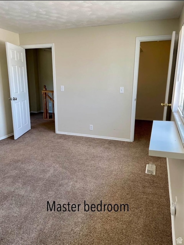 1192 W 4365 S Unit 1C, Salt Lake City, UT 84123 - carpeted spare room featuring baseboards