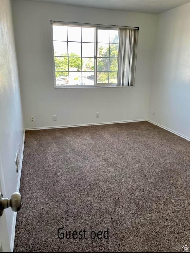 1192 W 4365 S Unit 1C, Salt Lake City, UT 84123 - spare room featuring carpet floors
