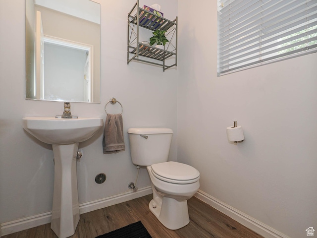 12102 S Mountain Peak Dr, Draper, UT 84020 - bathroom featuring wood finished floors and toilet