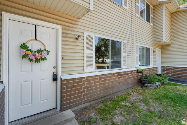 558 N Redwood Rd Unit 3, Salt Lake City, UT 84116 - view of exterior entry with brick siding