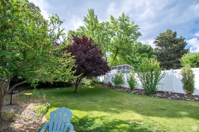 651 S Locust Ave, Pleasant Grove, UT 84062 - fenced backyard featuring a sunroom