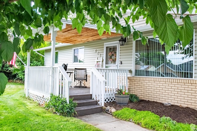 651 S Locust Ave, Pleasant Grove, UT 84062 - view of front of home with a wooden deck and a front yard