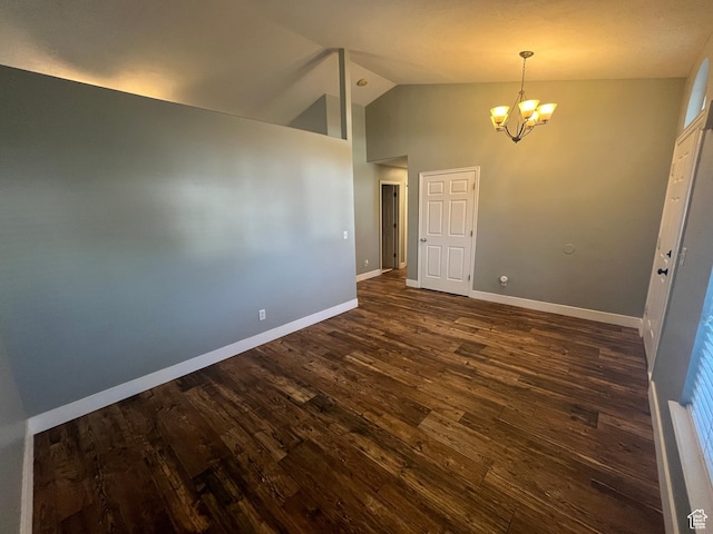 7886 S Abercrombie Ln, West Jordan, UT 84088 - spare room featuring a chandelier, dark wood finished floors, and high vaulted ceiling