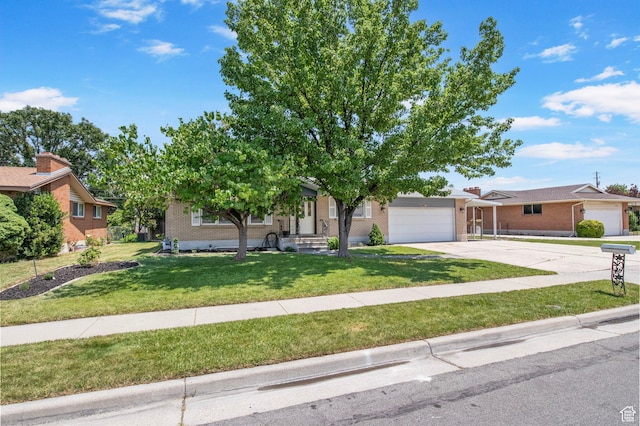 4663 S 2030 W, Taylorsville, UT 84129 - view of front facade featuring brick siding, an attached garage, driveway, and a front yard