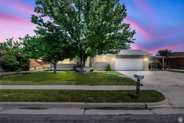 4663 S 2030 W, Taylorsville, UT 84129 - obstructed view of property featuring an attached garage, concrete driveway, brick siding, and a lawn