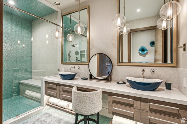 9156 N Sleeping Rock Cir, Kamas, UT 84036 - bathroom with a stall shower, double vanity, and backsplash
