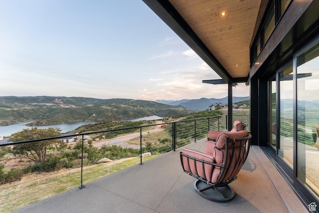 9156 N Sleeping Rock Cir, Kamas, UT 84036 - balcony featuring a water and mountain view