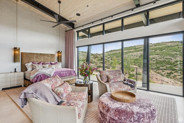 9156 N Sleeping Rock Cir, Kamas, UT 84036 - bedroom with a towering ceiling, access to exterior, a wooden ceiling with exposed beams, and tile patterned flooring