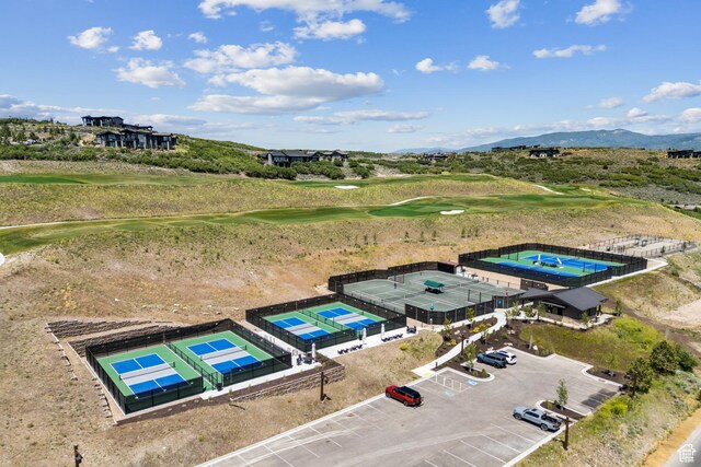 9156 N Sleeping Rock Cir, Kamas, UT 84036 - drone / aerial view of a golf course and a mountainous background