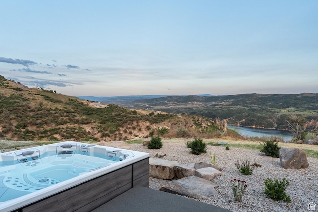 9156 N Sleeping Rock Cir, Kamas, UT 84036 - view of pool featuring a hot tub and a water and mountain view