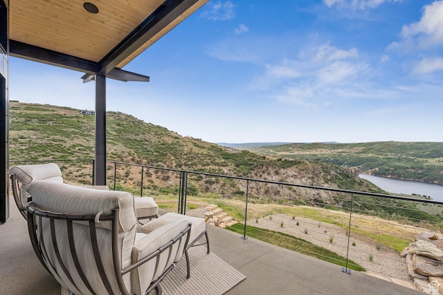 9156 N Sleeping Rock Cir, Kamas, UT 84036 - patio / terrace with a water and mountain view