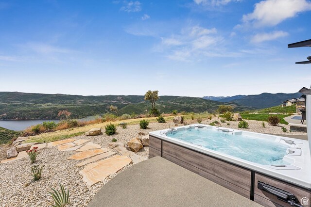 9156 N Sleeping Rock Cir, Kamas, UT 84036 - view of pool with a hot tub and a water and mountain view