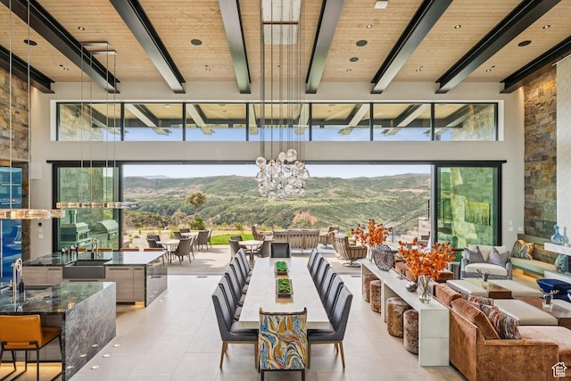 9156 N Sleeping Rock Cir, Kamas, UT 84036 - view of patio featuring outdoor dining space, a mountain view, and an outdoor hangout area