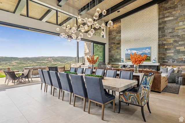 9156 N Sleeping Rock Cir, Kamas, UT 84036 - view of patio featuring outdoor dining area, a mountain view, and outdoor lounge area