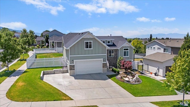 1592 E Maple Way S, Layton, UT 84040 - view of front of property with board and batten siding, stone siding, a garage, and a residential view