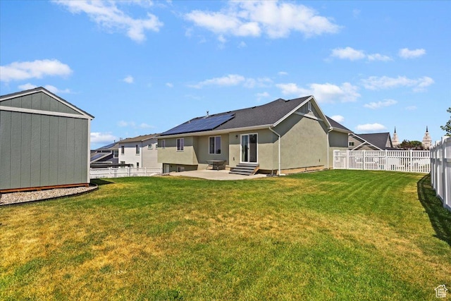 1592 E Maple Way S, Layton, UT 84040 - rear view of house featuring entry steps, a patio area, stucco siding, and a fenced backyard