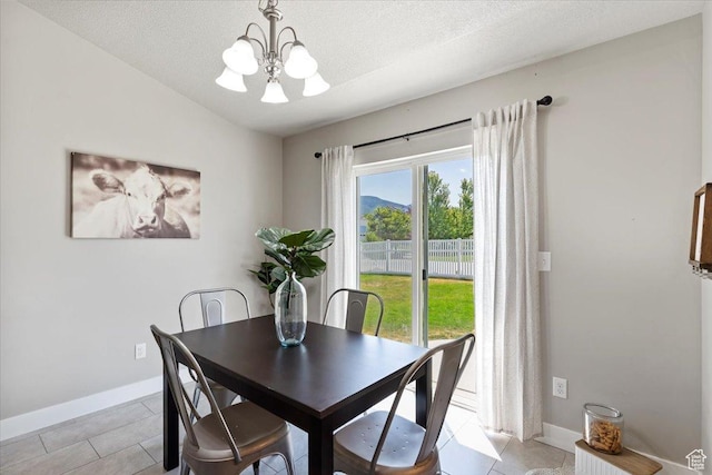 1592 E Maple Way S, Layton, UT 84040 - dining room with a chandelier, light tile patterned floors, and a textured ceiling