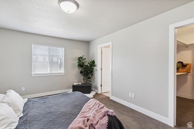 1592 E Maple Way S, Layton, UT 84040 - carpeted bedroom with a textured ceiling and baseboards