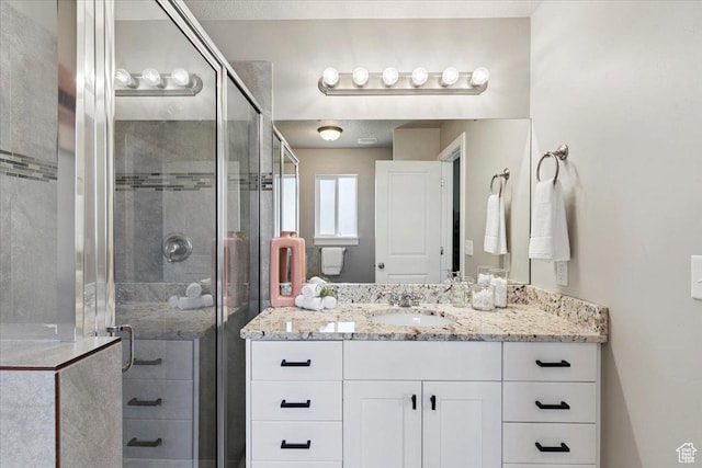 1592 E Maple Way S, Layton, UT 84040 - bathroom featuring vanity and a stall shower