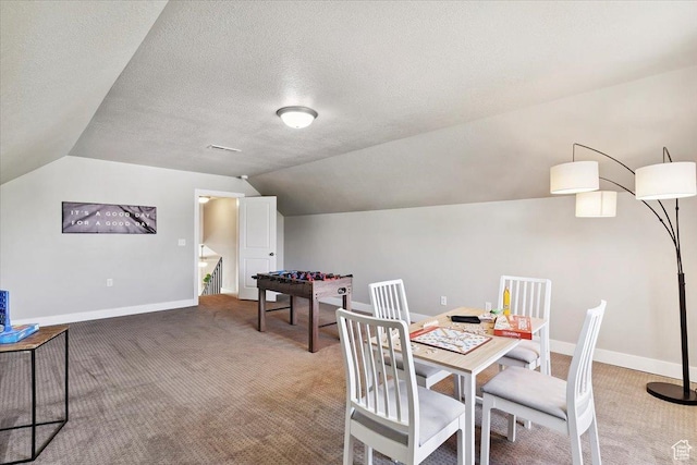1592 E Maple Way S, Layton, UT 84040 - carpeted dining space with vaulted ceiling and a textured ceiling