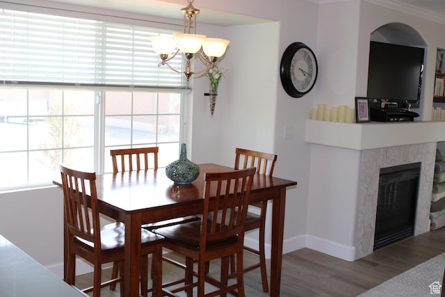 176 E Spencer Peak Way S Unit B11, Draper, UT 84020 - dining room with a chandelier, wood finished floors, and a high end fireplace