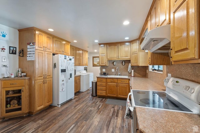961 Hillview Rd, Brigham City, UT 84302 - kitchen with white appliances, under cabinet range hood, dark wood-type flooring, backsplash, and recessed lighting