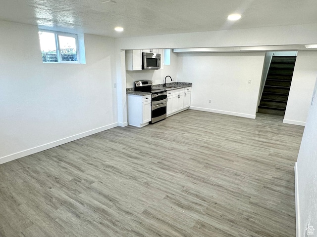 448 N 900 W, Salt Lake City, UT 84116 - bar with appliances with stainless steel finishes, light wood finished floors, recessed lighting, and stairs