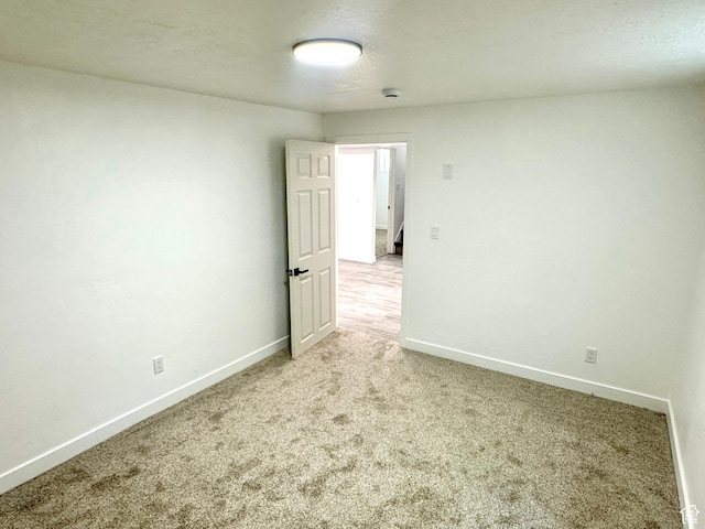448 N 900 W, Salt Lake City, UT 84116 - unfurnished room featuring light colored carpet and a smoke detector