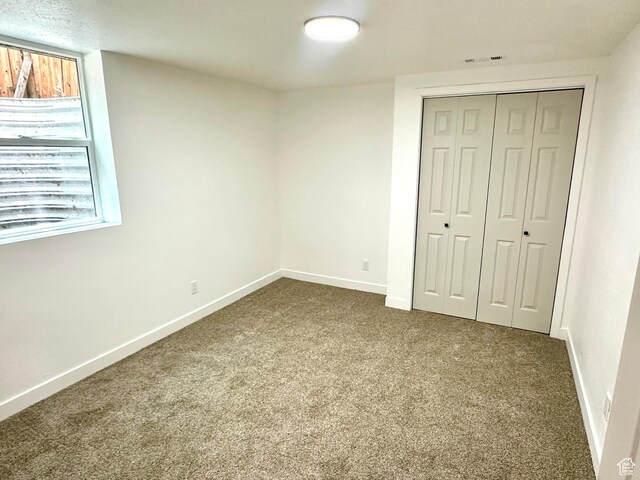 448 N 900 W, Salt Lake City, UT 84116 - unfurnished bedroom with carpet flooring and a closet