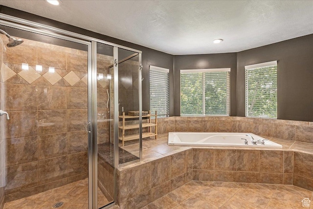 14618 S Gallatin Ln E, Draper, UT 84020 - full bath featuring a bath, a shower stall, and recessed lighting