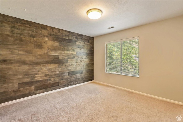 14618 S Gallatin Ln E, Draper, UT 84020 - carpeted spare room with wood walls and an accent wall