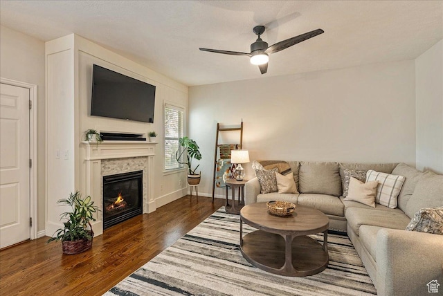 14618 S Gallatin Ln E, Draper, UT 84020 - living room featuring wood finished floors, ceiling fan, and a glass covered fireplace
