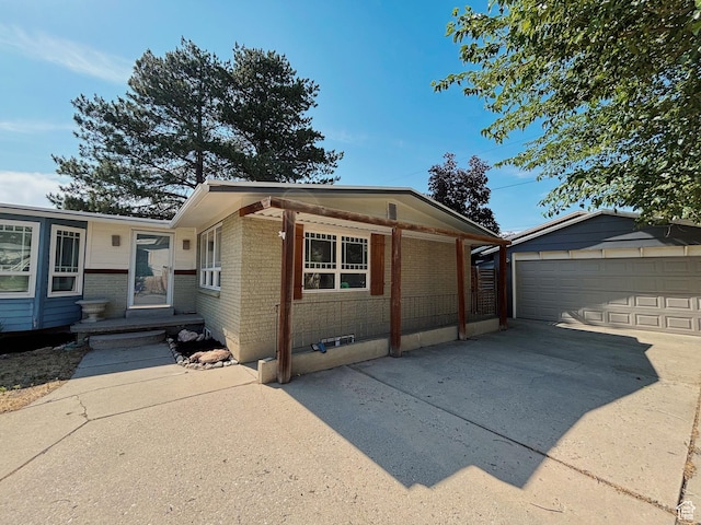 2057 E Castle Hill Ave, Cottonwood Heights, UT 84121 - view of front of house featuring brick siding and an outdoor structure