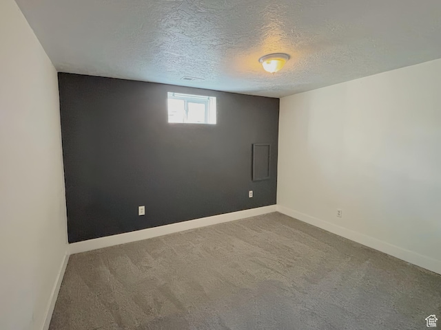 2057 E Castle Hill Ave, Cottonwood Heights, UT 84121 - unfurnished room with carpet flooring and a textured ceiling