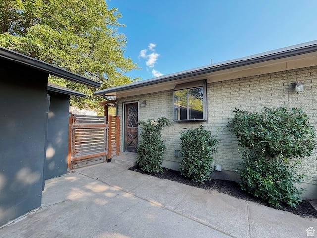 2057 E Castle Hill Ave, Cottonwood Heights, UT 84121 - property entrance with brick siding