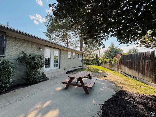 2057 E Castle Hill Ave, Cottonwood Heights, UT 84121 - fenced backyard with entry steps and a patio