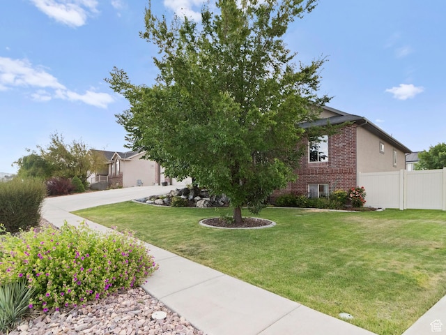 2618 W Mountain Rd, Tremonton, UT 84337 - view of property hidden behind natural elements with brick siding