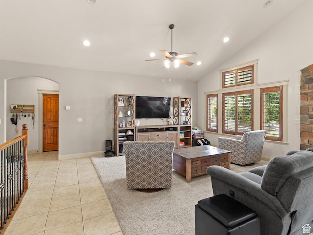2618 W Mountain Rd, Tremonton, UT 84337 - tiled living room with a ceiling fan, recessed lighting, arched walkways, and vaulted ceiling